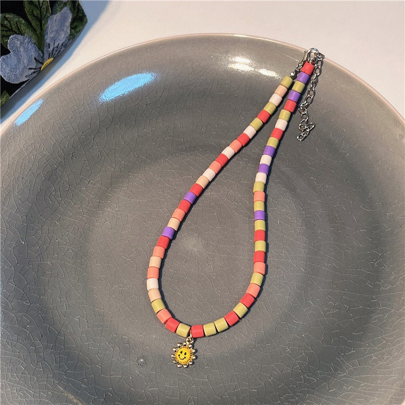 Candy colored soft clay smiley face necklace