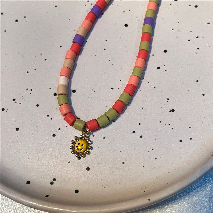 Candy colored soft clay smiley face necklace