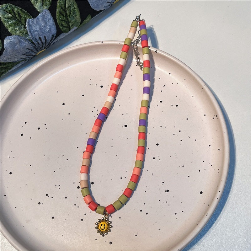 Candy colored soft clay smiley face necklace