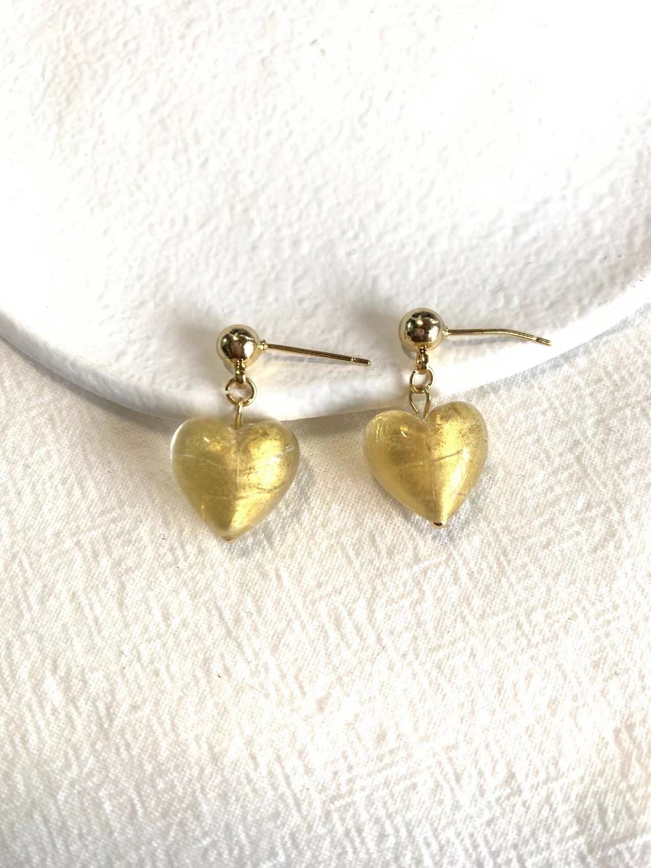 Gold love earrings