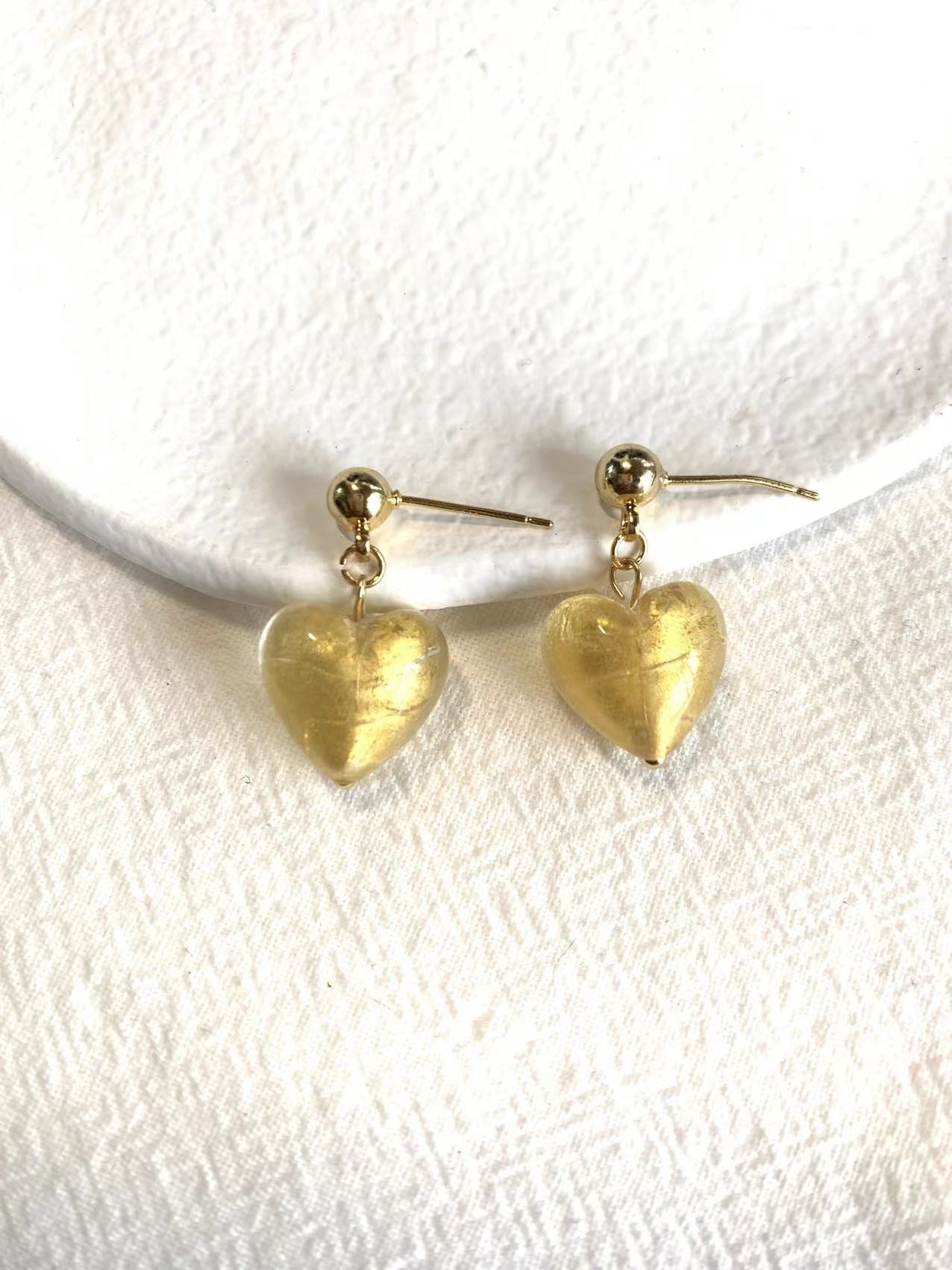 Gold love earrings
