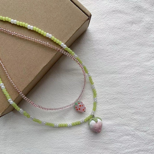 Two small strawberries necklace