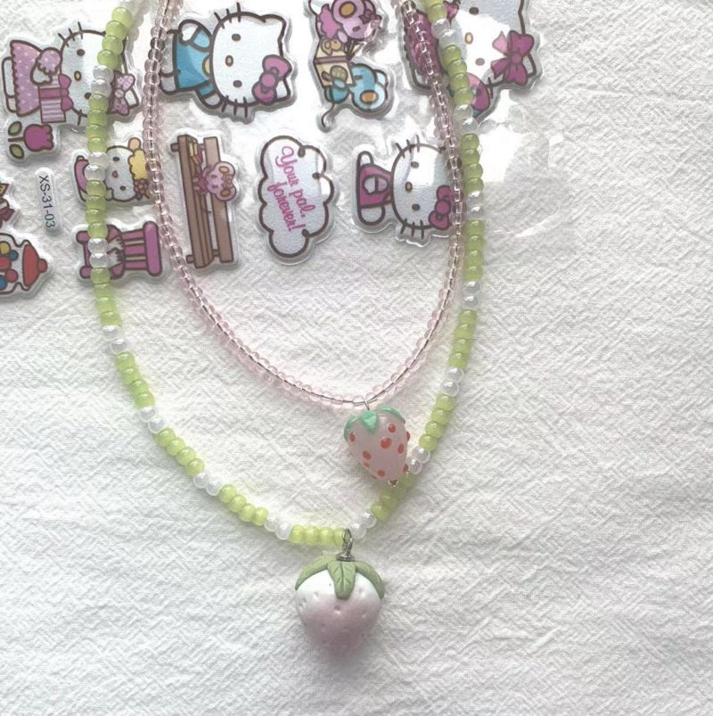Two small strawberries necklace
