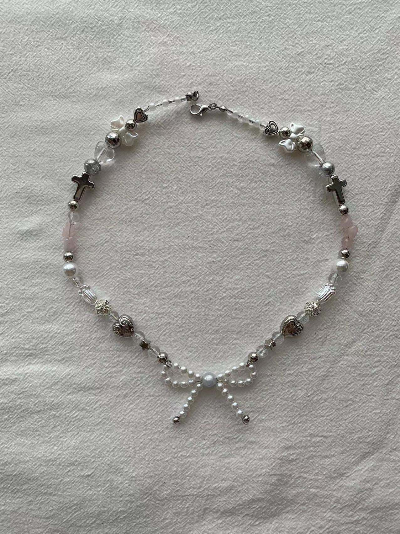 bow y2k cross necklace