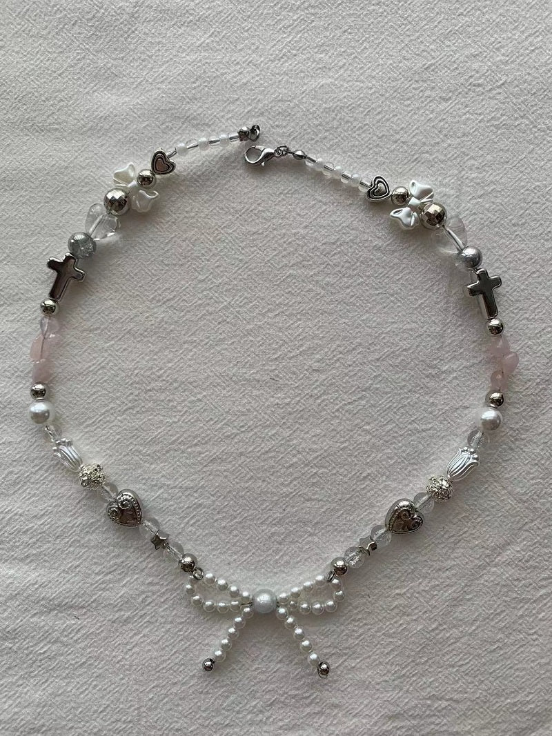 bow y2k cross necklace