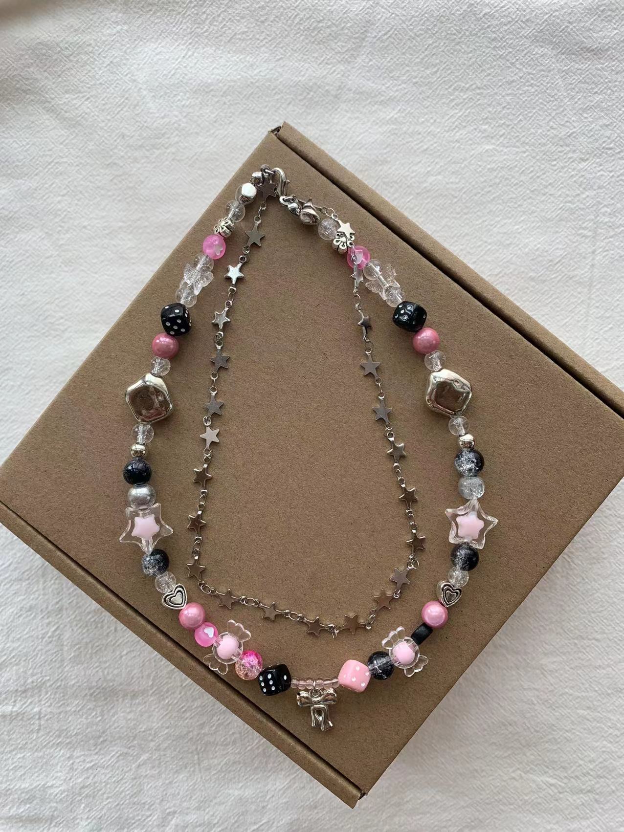 bow black pink necklace