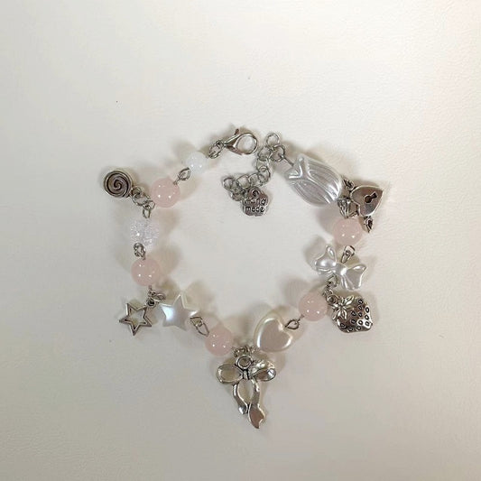 pastel pink bow bracelet