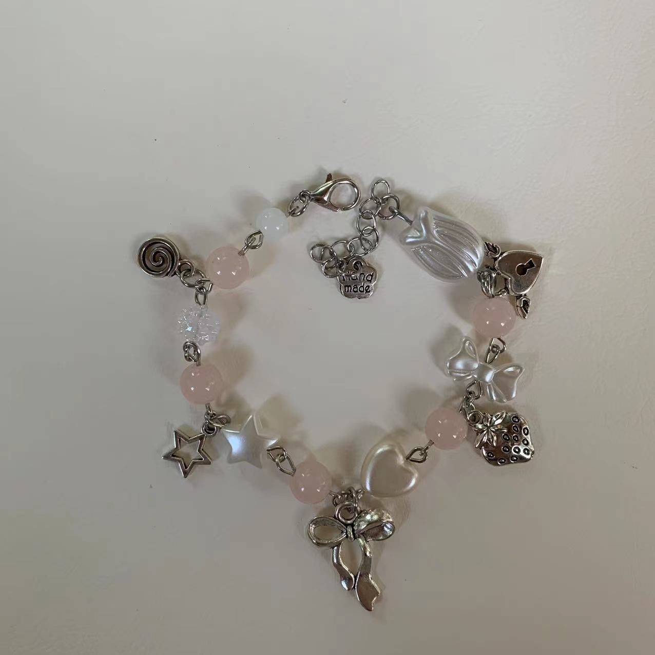 pastel pink bow bracelet