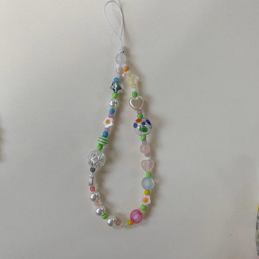 Candy colored sphere phone charm