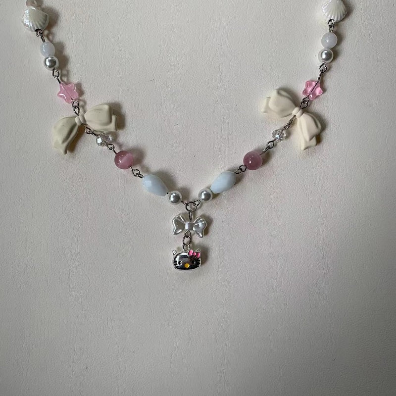 pastel coquettish KT magnet necklace