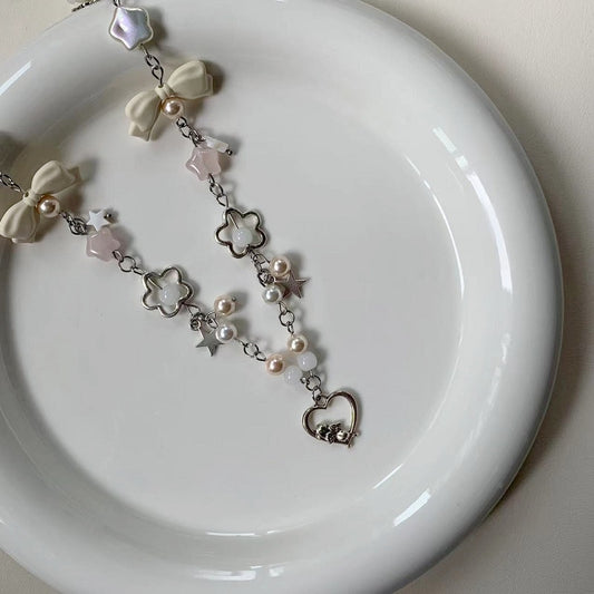 angel bow pink necklace