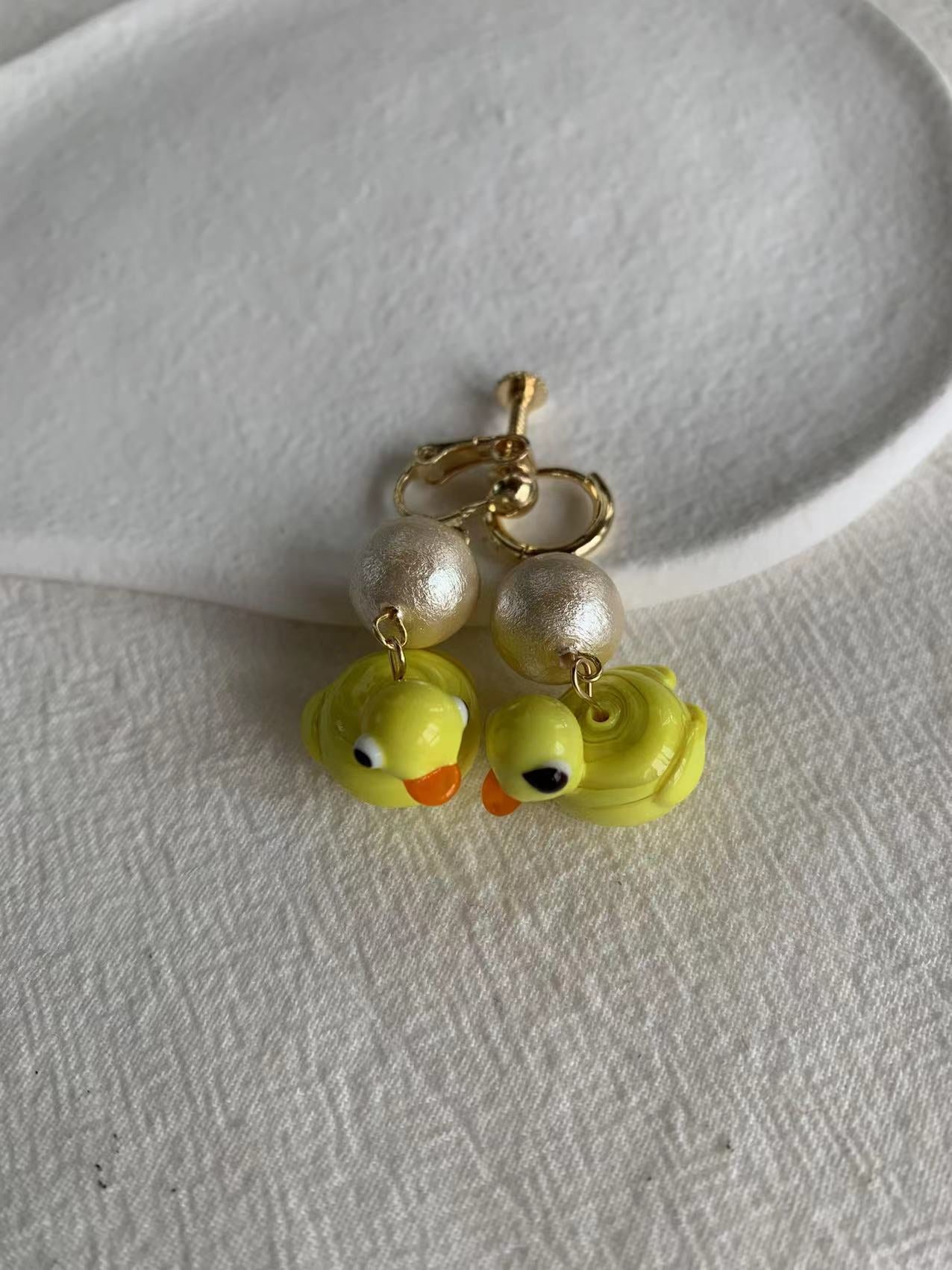 Yellow duckling pearl earrings