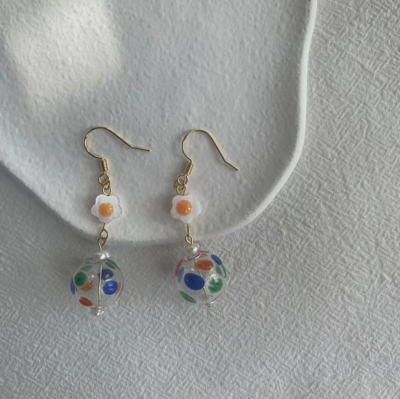 Hollow glass bead earrings