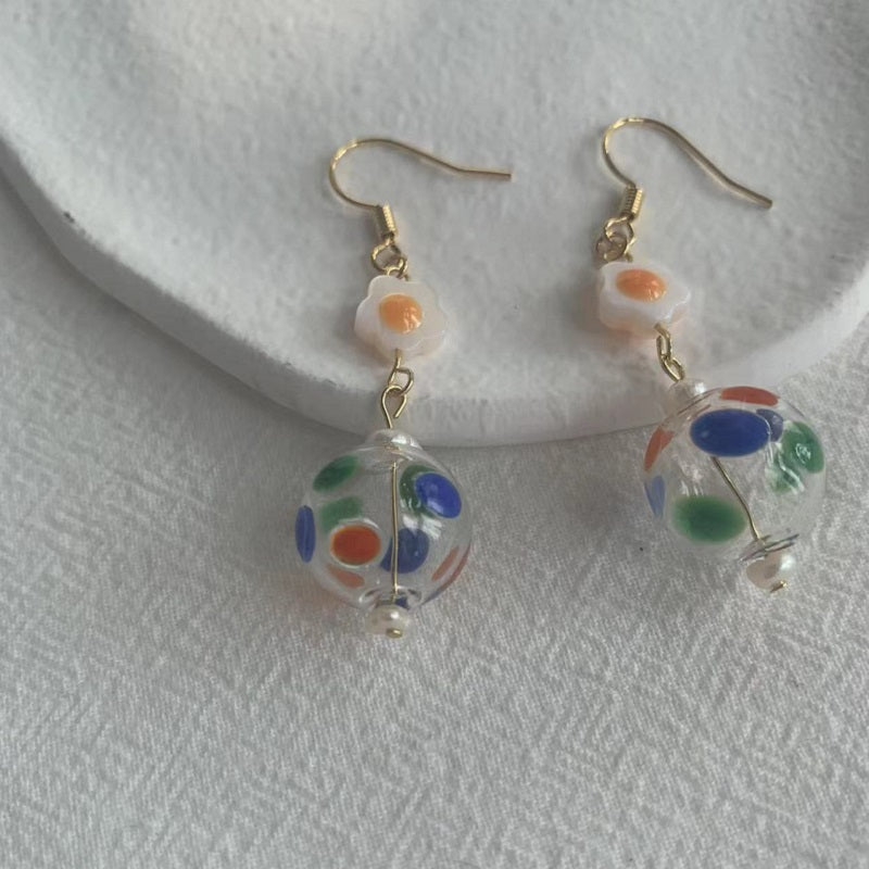 Hollow glass bead earrings